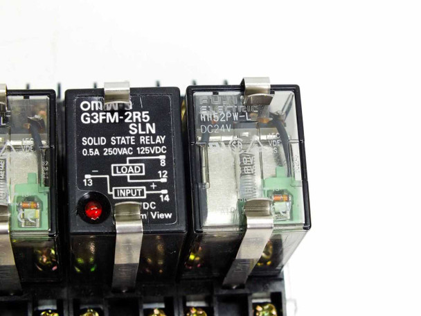 Close-up of Omron G3FM-2R5 SLN solid state relay label showing 0.5A 250VAC 125VDC rating and Fuji HH52PW-L DC24V relay