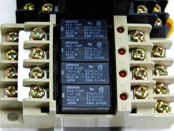Omron G6B-1114P relays in PYFO8A sockets close-up showing labels: 24VDC coil, 5A 250VAC contact rating, Made in Japan