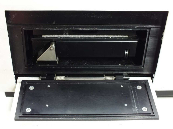 Labsystems Luminoskan EL 391A interior drawer detail showing microplate carriage and optical path mechanism