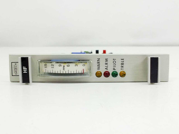 GasTech 24-0142 HF Input Module — front panel view showing brushed aluminum faceplate with analog meter scale, GasTech and HF labels, and four LED indicators: WARN, ALRM, PILOT, TRBLE