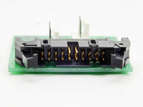 FSI 290109-400 Stepper Motor Interface Board – close-up front edge view showing multi-pin black IDC connector with gold-plated contacts