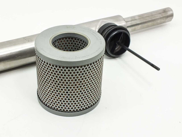 Mann C1337 filter components laid out — cylindrical perforated mesh filter element, black rubber end cap, and stainless steel pole