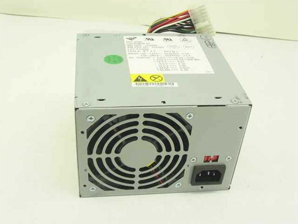 IBM 12J5991 API-6056 90W desktop power supply – rear view showing 80mm cooling fan and IEC AC input connector with red voltage selector switch