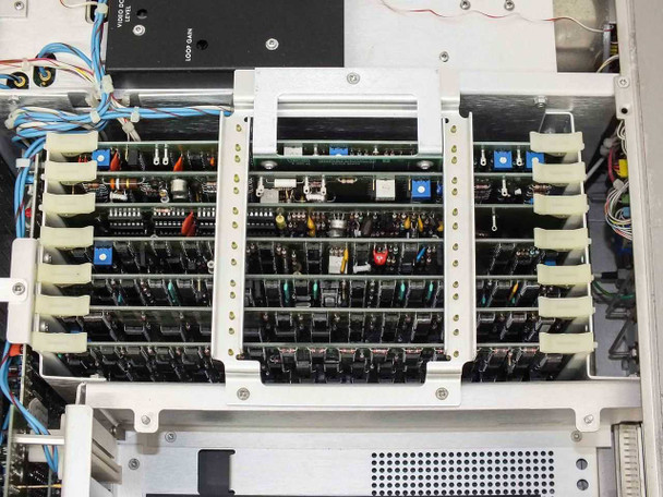 Tektronix 7912AD — interior close-up of main internal board array showing multiple populated circuit cards in card cage with blue trim and dense component population