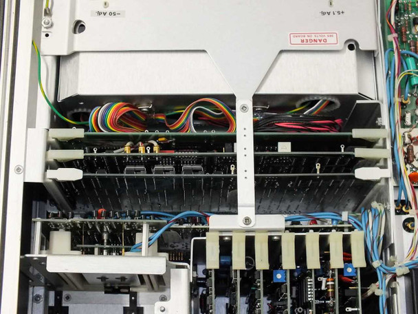 Tektronix 7912AD — interior close-up of secondary board section showing smaller card stacks with multicolor ribbon and wire harnesses
