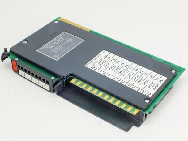 Allen-Bradley 1771-IDC Isolated AC/DC Input Module — angled top view showing gold edge connector and terminal block with input wiring labels