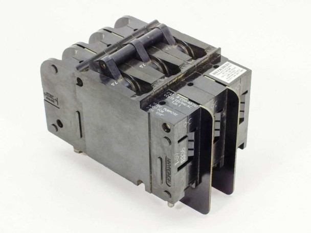 Heinemann CD3-A3-DU 3-Pole Circuit Breaker – angled side view showing pole housing, mounting feet, and Heinemann nameplate