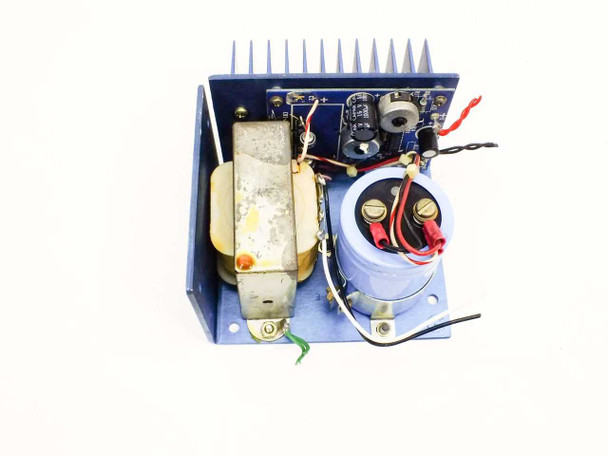 Standard Power SPS 40-5 power supply — top-down view from opposite angle showing transformer, filter capacitor, and output wiring leads
