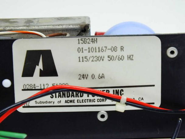 Standard Power 15B24H rating label closeup – model 15B24H, MPN 01-101167-08 R, 115/230V 50/60Hz, 24V 0.6A, Standard Power Inc subsidiary of Acme Electric Corp
