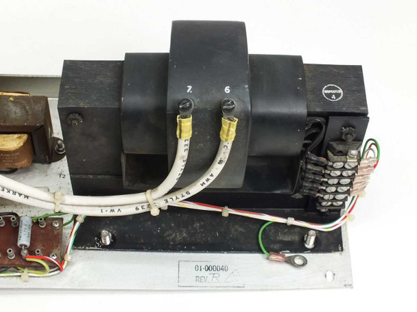 Varian HV DC Rectifier Board – top view of main transformer block with terminal connections numbered 7 and 6; part number plate 01-000040 and REV marking visible on chassis