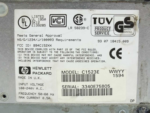 HP C1523E JetStore 2000 bottom label showing model number, serial number, input voltage 100-240V AC, frequency 50-60 Hz, max current 0.5A, UL/CSA/TÜV/CE certifications, and Made in UK marking