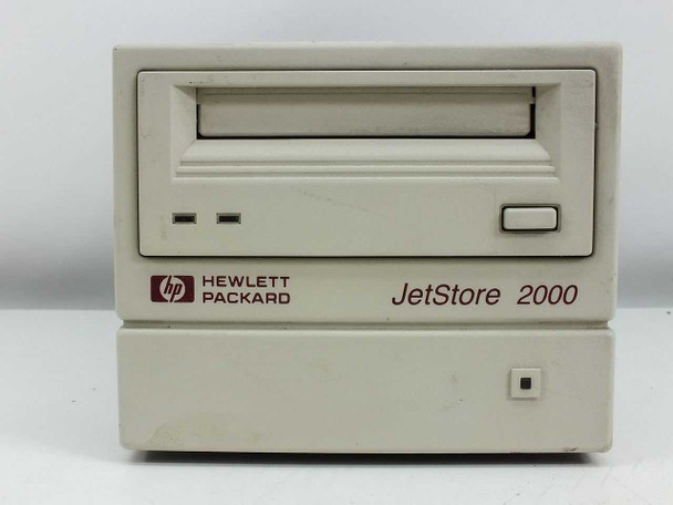 HP C1523E JetStore 2000 External Tape Drive — front panel close-up showing tape drive slot, eject button, and HP Hewlett Packard JetStore 2000 logo