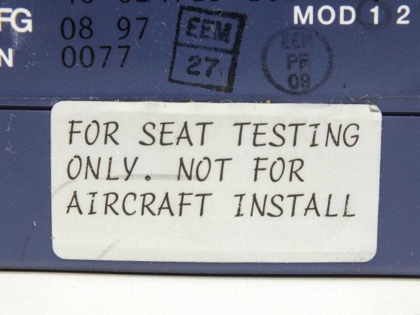 Close-up of FOR SEAT TESTING ONLY NOT FOR AIRCRAFT INSTALL warning label on 40-624715-101 monitor