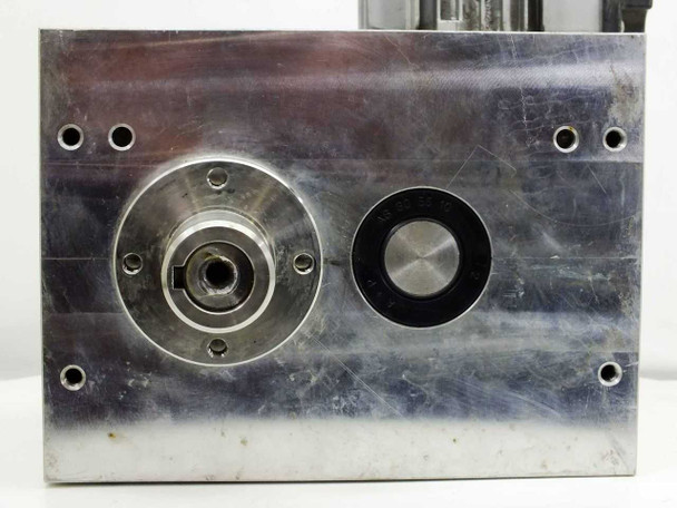 TaktOMat XP 80 gearbox output face — machined aluminum housing showing primary output shaft hub and secondary port with seal
