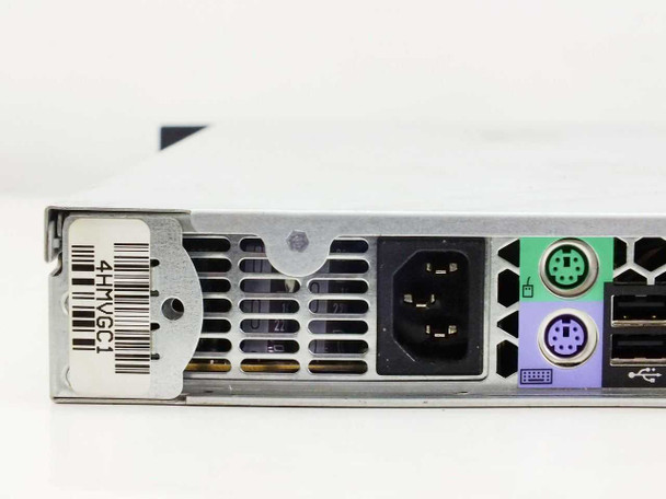 Dell PowerEdge 860 rear left detail showing IEC AC power inlet, PS/2 ports, and USB ports