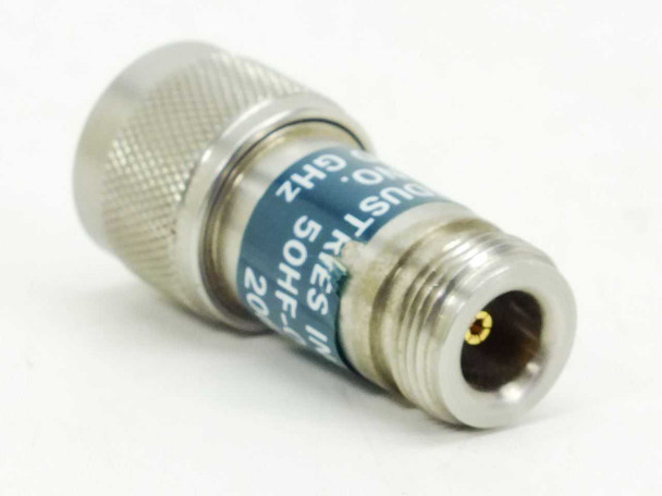 JFW Industries 50HF-020 attenuator — angled view from N-female connector end showing teal label with model number 50HF-020 and 20dB marking