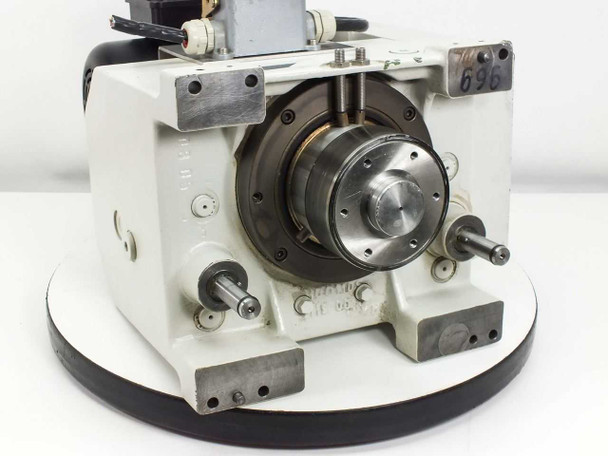 Singulus HC0110S – front spindle face view showing precision bearing hub, output shaft, and alignment pins; asset tag 696 visible