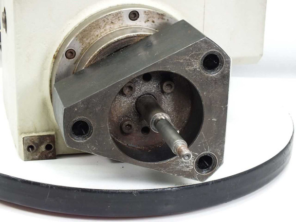 TC47 servo module output shaft flange and bearing housing — close-up front view showing surface wear
