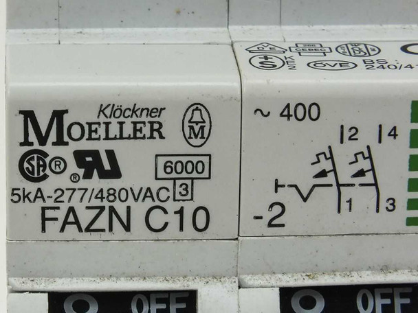 Eaton Moeller FAZN C10 circuit breaker – close-up of rating label showing Klockner Moeller brand, 5kA-277/480VAC, 2-pole schematic, UL and CSA marks