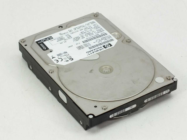 HP DTLA-307015 15.3GB ATA/IDE 3.5" desktop hard drive — top view showing platter cover and HP Hewlett-Packard label