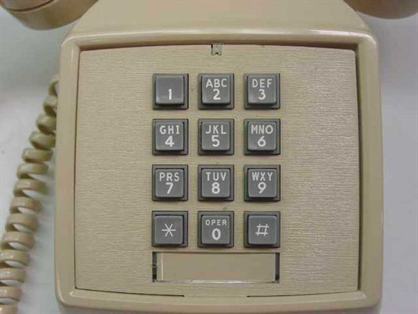 ITT Cortelco 250044-MBA-20M close-up of 12-button DTMF touchtone keypad with alphanumeric labels