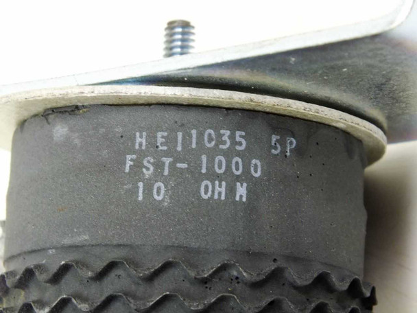 Close-up of FST-1000 label showing HE11035 5P part number and 10 OHM resistance marking printed on resistor end cap