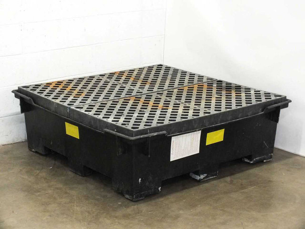 80-gallon HDPE chemical spill containment sump pallet shown from above with two-piece black grating installed, yellow caution labels visible on side