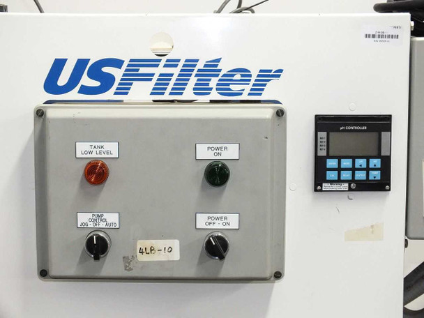 USFilter control panel front showing Tank Low Level indicator, Pump Control selector, Power On/Off switches, and GF Signet pH/ORP controller display