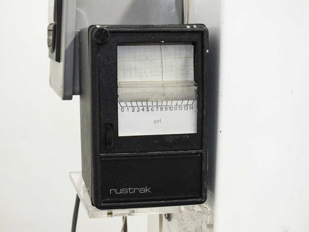 Rustrak Model 288 strip chart recorder showing pH scale 0–14, mounted to panel side