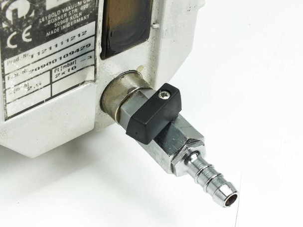 Close-up of Leybold D2.5E rating plate and DN16KF stainless KF flange inlet port with black quick-connect fitting and barb outlet