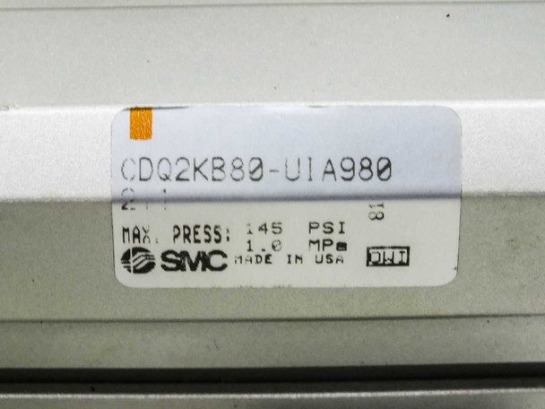 SMC CDQ2KB80-UIA980 rating label showing model number, Max Press 145 PSI / 1.0 MPa, Made in USA