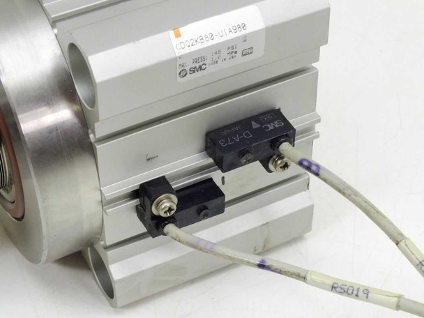 SMC CDQ2KB80-UIA980 – side view showing two D-A73 reed-switch position sensors mounted on cylinder body