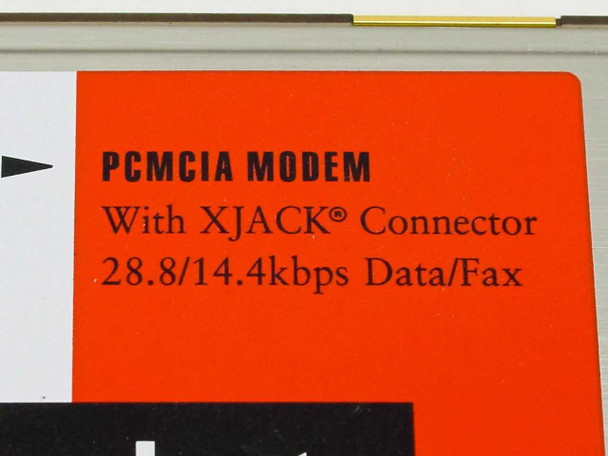 Close-up of Megahertz XJ2288 PCMCIA modem label reading PCMCIA Modem with XJack Connector 28.8/14.4 Kbps Data/Fax