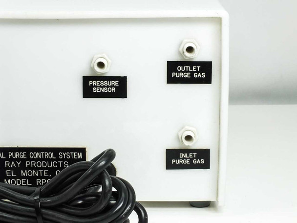 Ray Products RPC-DPC rear panel close-up showing labeled purge gas inlet, purge gas outlet, and pressure sensor barbed fittings with power cord