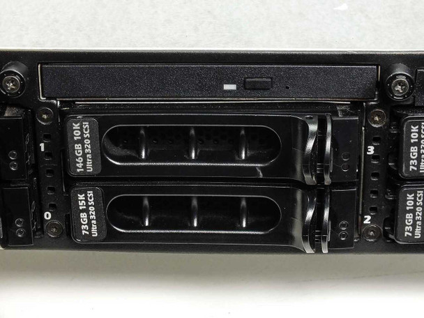 Dell PowerEdge 2850 left drive bay section showing four hot-swap SCSI drives: 73GB 15K Ultra 320, 146GB 10K Ultra 320, and two 73GB 10K Ultra 320