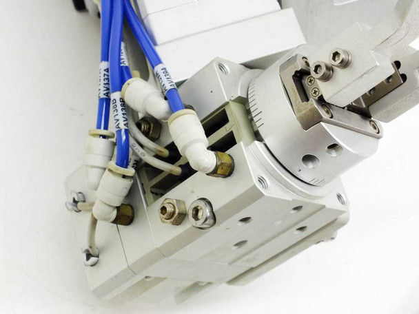 SMC MRHQ16D-180S-N rotary gripper head closeup showing jaws, push-in pneumatic fittings with labeled blue tubing lines (AV1375, AV1380), and mounting detail on linear slide