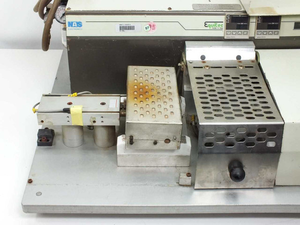 Top view of NAS Electronics Equitec assembly tool showing heated platen modules and NAS Electronics label
