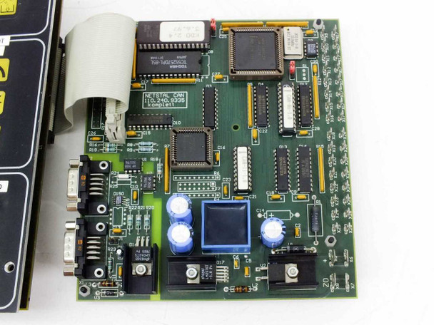 Netstal CAN 110.240.9335 Komplett interface PCB close-up showing main ICs, DB9 connectors, Toshiba and Sanvik chips, and ribbon cable connector