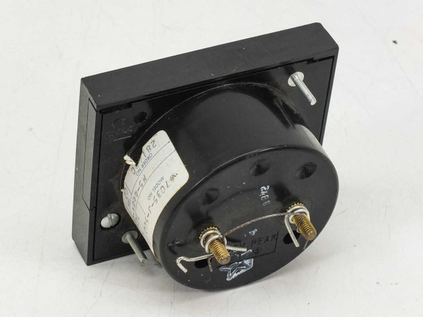 Omega 7035-J-500 panel meter — rear/side view showing cylindrical meter movement, two gold terminal posts, and mounting hardware