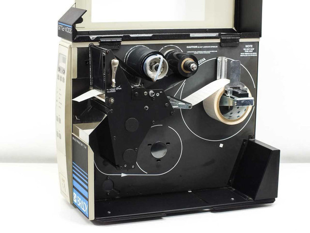 Brady BradyPrinter THT 300X-Plus media compartment open showing ribbon and media spindle layout with loading diagram