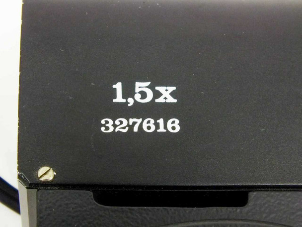Wild 327616 illuminator close-up of label showing '1,5x' magnification marking and part number 327616 printed on the housing