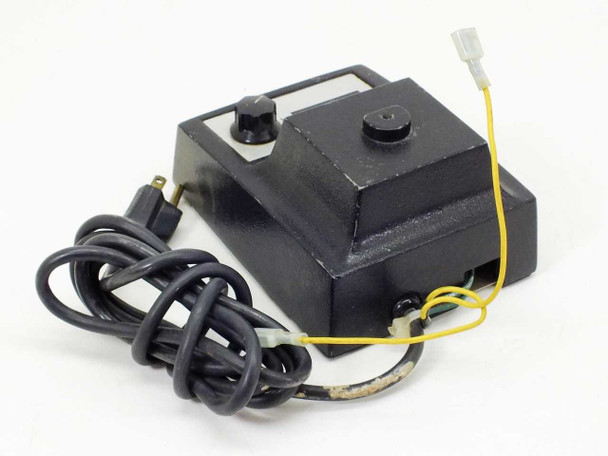 Bausch & Lomb 31-35-28 microscope illuminator transformer — three-quarter rear view showing AC power cord, yellow output wire, and modified lamp connector