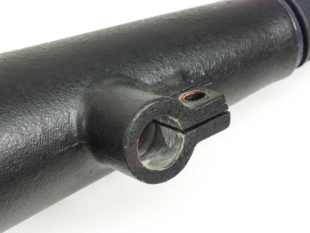 Close-up of Bausch & Lomb microscope lamp focusing mount clamp collar showing screw adjustment and wear on metal surfaces