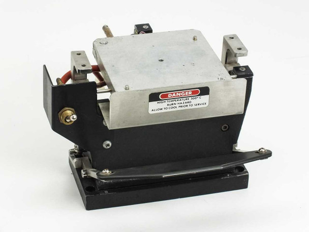 Steag Firstlight heating element with lifting bar stand — front-right view showing danger label rated 300°C and black anodized base