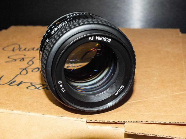Nikon AF Nikkor 50mm f/1.4 lens – rear element view showing 'AF NIKKOR 50mm 1:1.4 D' markings