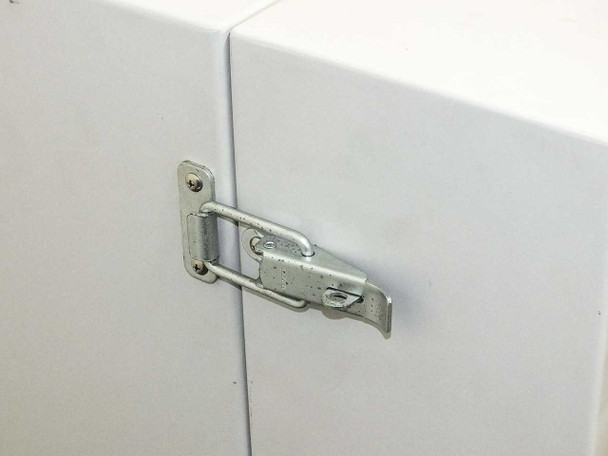 Hugle Electronics 430 – door latch hardware close-up showing toggle latch in closed position