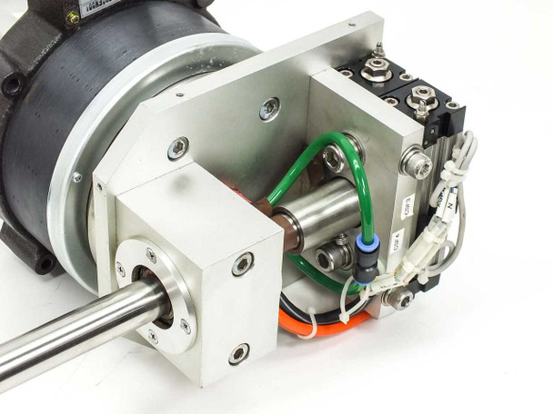 NSK YS2020FN001 rotary motor front face with aluminum mounting block, pneumatic lines, and SMC actuator detail