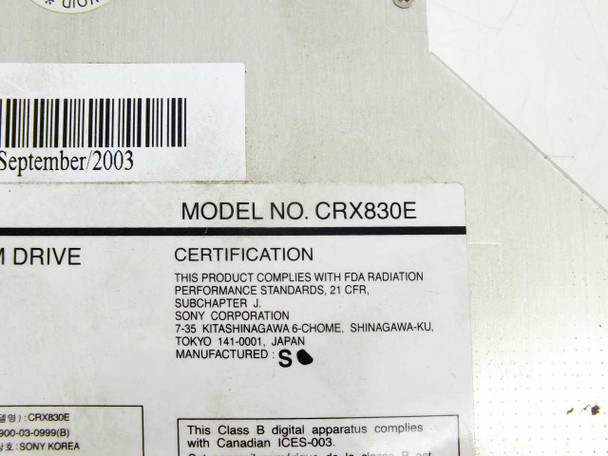 Sony CRX830E label close-up showing model number, September 2003 manufacture date, and certification text