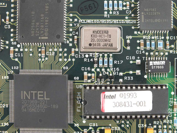 Intel 350020-001 EtherExpress ISA LAN adapter – close-up of Intel 201969-221 controller IC, Kyocera 20MHz crystal, and Intel 308431-001 BIOS chip label