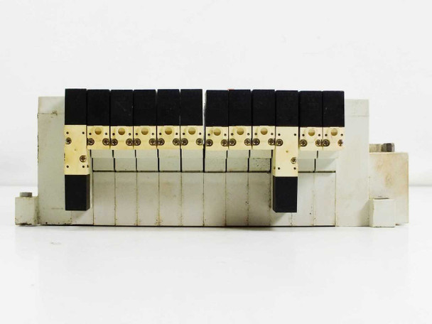 SMC solenoid valve manifold – rear side view showing solenoid coil connectors and valve base